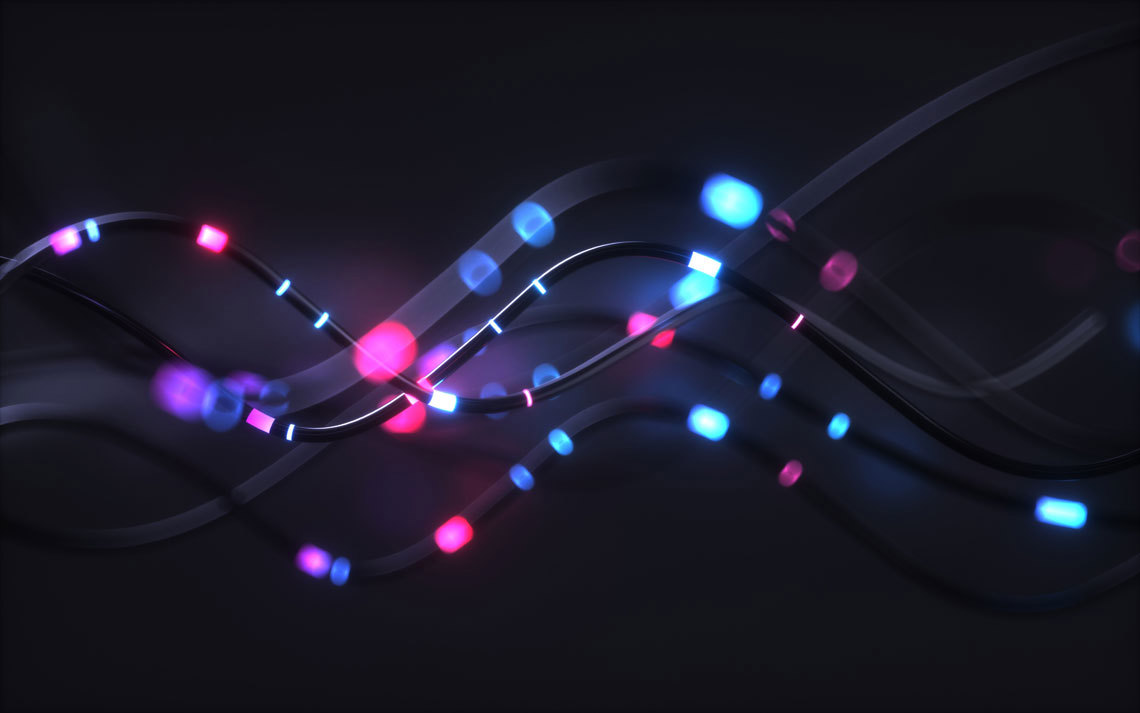Abstract background featuring glowing lights in various colors, creating a vibrant and dynamic visual effect.